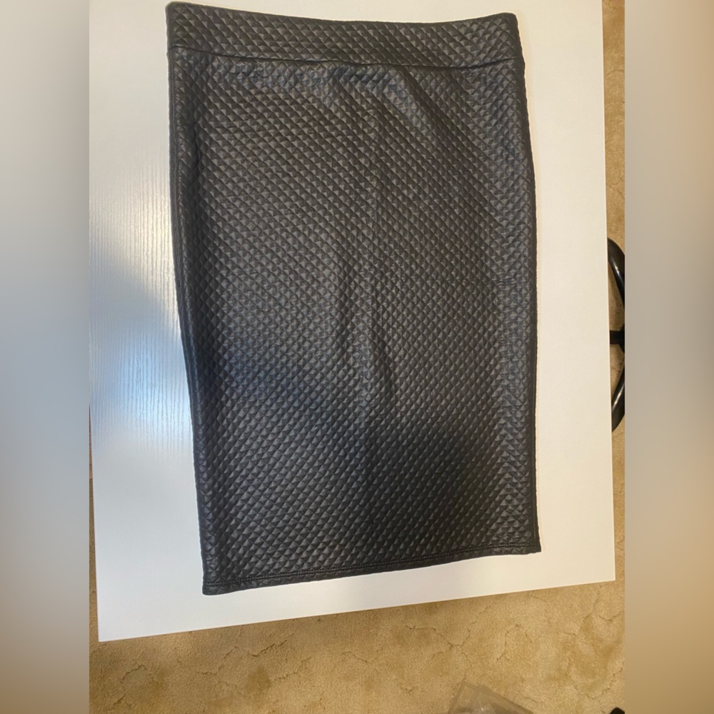Pencil, texture, leather skirt